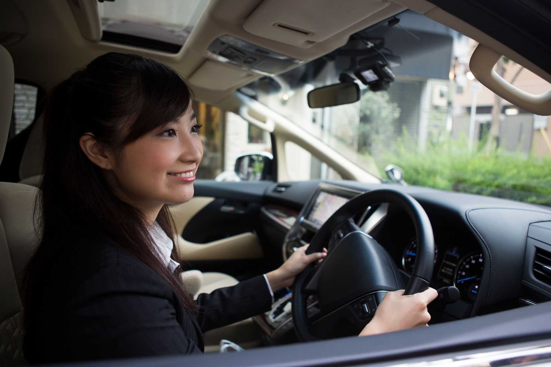 A woman driving a car